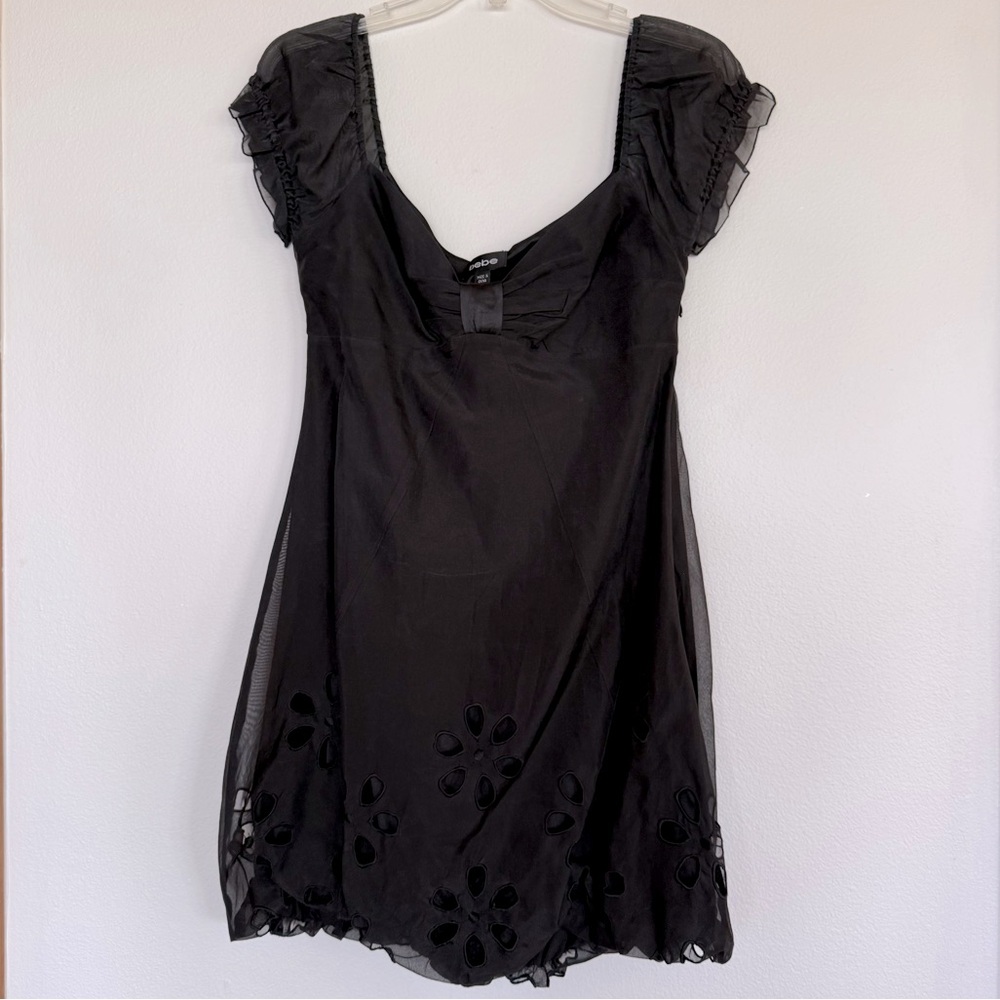 Black Cocktail Bubble Dress with cut out flower design on bottom